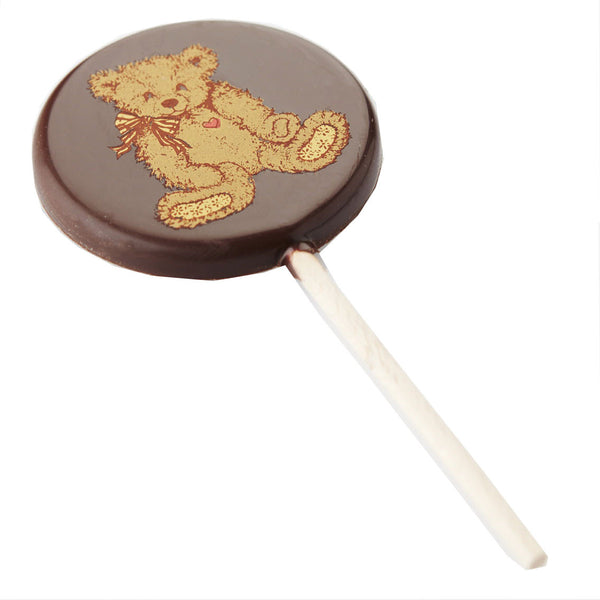 Lolly met beertje in volle chocolade. Verkrijgbaar in witte chocolade, melkchocolade of fondantchocolade. DelRey / Lollipop with bear in full chocolate. Available in white chocolate, milk chocolate or dark chocolate. DelRey